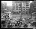 Image of Moving the totem pole, Pioneer Square, Seattle, circa 1923