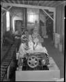 Image of Workers packing eggs, circa 1925