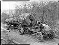 Image of Kelly-Springfield truck hauling logs, circa 1925