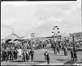 Image of Ferris wheels and crowds at the Western Washington Fair, Puyallup , circa 1924