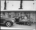 Image of Men with Rainiers pennant outside Sick's Stadium, Seattle, circa 1939