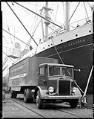 Image of Trailer truck and freighter at Seattle dock, 1935