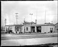Image of Mac's Complete Service automobile service station, circa 1933