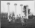 Image of Students in front of columns on University of Washington campus, Seattle, circa 1925