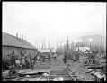 Image of Logging camp with crew, circa 1910