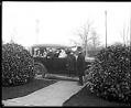 Image of Mayor Ole Hanson with family and car, circa 1920