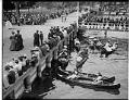 Image of Crowds and canoes at the waterfront in Leschi Park, circa 1911