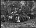 Image of Loggers with large log, circa 1907