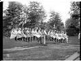 Image of Large group of children on a seesaw in Volunteer Park, circa 1909