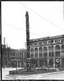 Image of Totem pole in Pioneer Square, Seattle, circa 1905