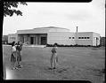 Image of Three women standing in front of the Hughes Penthouse Theatre on the University of Washington campus, Seattle, May 1940