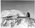 Image of Boeing bomber B-17 in flight with Mount Rainier in the background, 1941