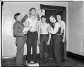 Image of Young men in the Civilian Conservation Corps receiving a physical exam, 1937