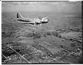 Image of Aerial view of an early Boeing B-17E in flight, Seattle, 1941