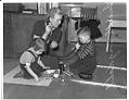 Image of Lucille Engdahl working with deaf children, University of Washington Speech Clinic, Seattle, 1939