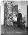 Image of Kenneth Callahan with some of his paintings, Seattle, 1937