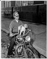 Image of Gale Dresden and his dog Toughy on a motorcycle, June 29, 1958