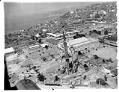 Image of Aerial view, looking northwest, of the construction of the Space Needle, Seattle, 1961