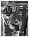 Image of Elvis Presley on the monorail during the World's Fair, Seattle, September 1962