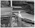 Image of Mill worker at a rolling machine in a plywood mill, July 1937