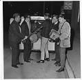 Image of The Kingsmen loading instruments into trailer, Seattle, 1964