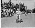 Image of Tricycle rider in the Bicycle Derby, Redmond, August 17, 1963