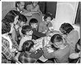 Image of Incarcerated children playing Monopoly at the Puyallup Assembly Center, Puyallup, 1942