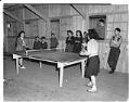 Image of Incarcerees playing table tennis at the Puyallup Assembly Center, Puyallup, 1942
