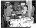 Image of Incarcerees in food line at the Puyallup Assembly Center, Puyallup, 1942