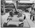 Image of Woman working on a tank, Pacific Car and Foundry company, Renton, 1943