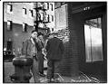 Image of Men on a corner in Seattle's Chinatown, 1932