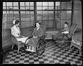 Image of Nurse reading to boys in wheelchairs at Harborview Hospital, Seattle, 1933