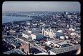 Image of Aerial view, looking northwest, of the U.S. Science Pavilion and the Seattle World's Fair grounds, with Elliott Bay, 1962
