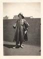 Image of Abbie Ewart in nurse's rain outfit on the roof of the Irving Hotel, New York, May 1918