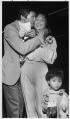 Image of Tho Nguyen meeting his family at Sea-Tac airport, Seattle, July 26, 1983