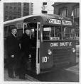 Image of George Moyer and R. A. Cole boarding Dime Shuttle, Seattle, February 16, 1954