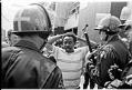 Image of Tyree Scott being arrested at UCWA protest at Seattle Central Community College, June 7, 1972