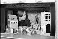 Image of Erhard Rom with model of scene from 