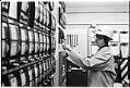 Image of Juanita Collins, chemical engineer, checking production at the Monsanto Corporation plant, Seattle, December 16, 1973