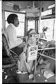Image of Curtis Robinson at wheel of Metro trolley bus, Seattle, November 1975