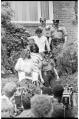 Image of Police escorting three protesters from the South African consulate, Seattle, June 14, 1986