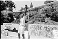 Image of Ras Bongo protesting in front of the South African Consulate's home, Seattle, July 17, 1988