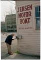 Image of Anchor Jensen checking his mailbox, Seattle, April 28, 1997