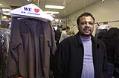 Image of Soud Kirat, owner of Fine Cleaners, in his store, December 31, 2002