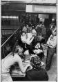 Image of Vietnamese babies being checked in at Sea-Tac airport, April 6, 1975