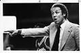Image of Lenny Wilkens coaching from sideline of Sonics game, Seattle, December 1982