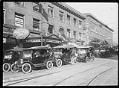 Image of Jitney buses lined up on street, Seattle, 1918