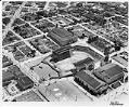 Image of Aerial view of Washington State Coliseum construction site showing original buildings, Seattle, 1960