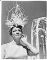 Image of Donna Rydberg modeling a John Eaton hat, Seattle, 1962