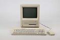 Image of Apple Macintosh SE computer with keyboard and mouse, ca. 1987
